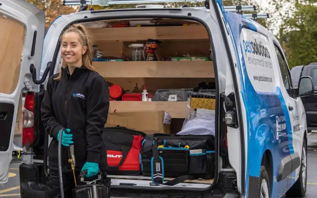 Pest Bird Solutions - Service Manager Gemma Sutherland in front of company van